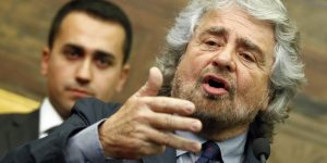 Leader of  the 5-Star movement and comedian Beppe Grillo talks to reporters at the end of consultations with Italian Prime Minister-designate Matteo Renzi at the Parliament in Rome