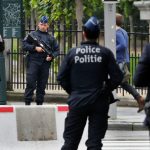 Belgian police officers patrol in central Brussels