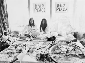 Closeup J.Lennon W/Bride Y. Ono In Bed