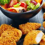 chicken nuggets and fresh vegetable salad