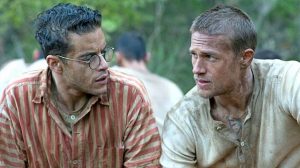 Charlie Hunnam (s) e Rami Malek