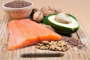 Sources of omega 3 fatty acids: flaxseeds, avocado, salmon and walnuts