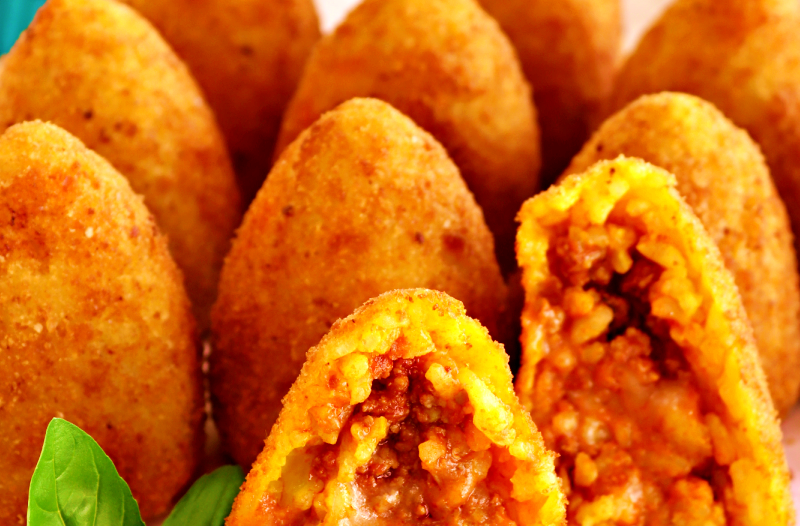 Arancini di riso al ragù, e sei in Sicilia | ILFOGLIETTONE ...