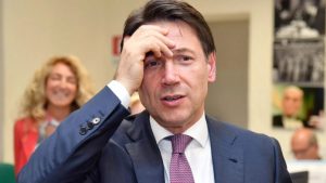 Giuseppe-Conte-mani-in-faccia-696x392